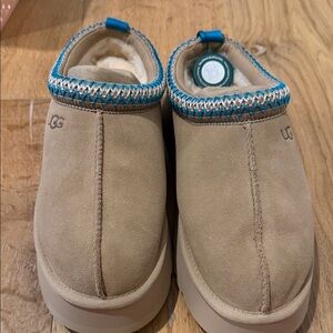 UGG Tan Slippers with Blue Trim